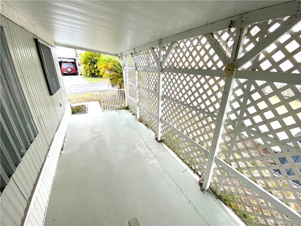 Photo of 342 NE Tropicalia Lane, Jensen Beach, FL 34957 (MLS # M20044559)