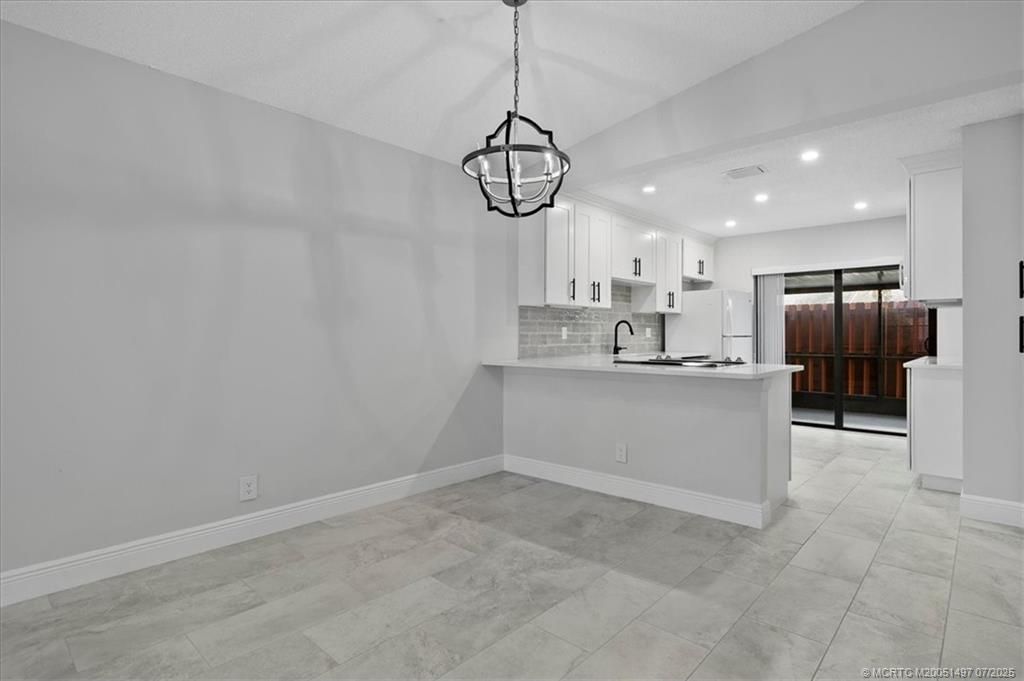 Photo of 8085 SE Villa Circle, Hobe Sound, FL 33455 (MLS # M20051497)