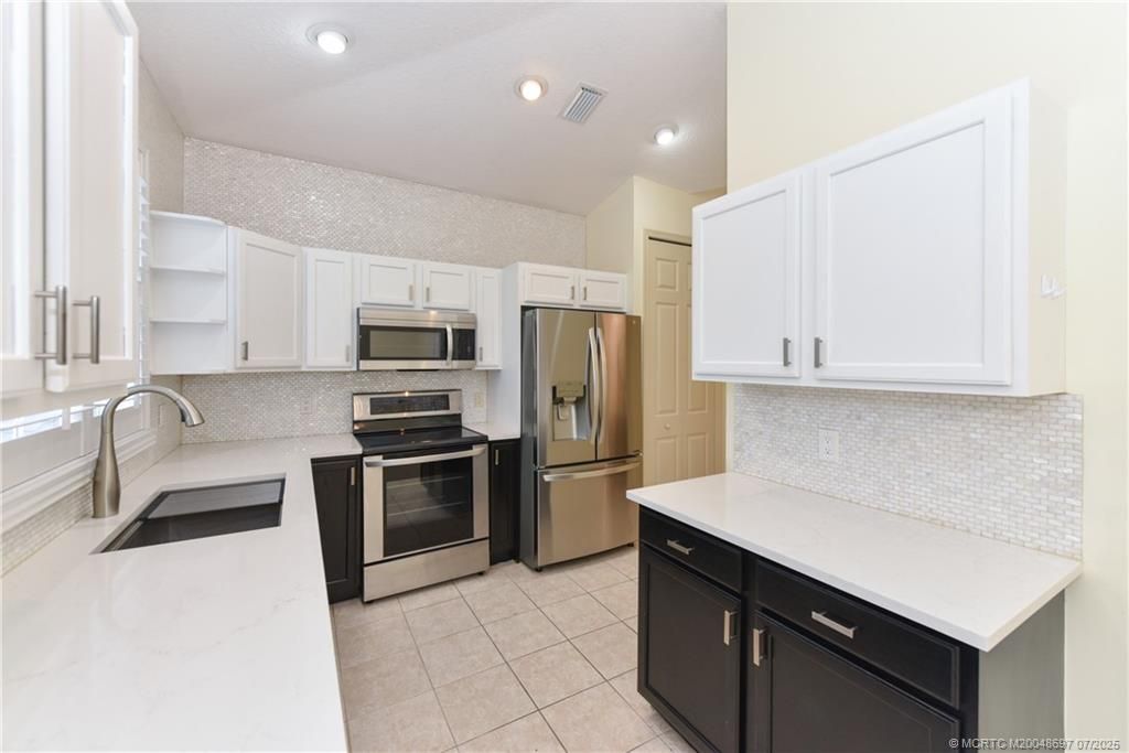 Photo of 9314 Wentworth Lane, Port Saint Lucie, FL 34986 (MLS # M20048697)