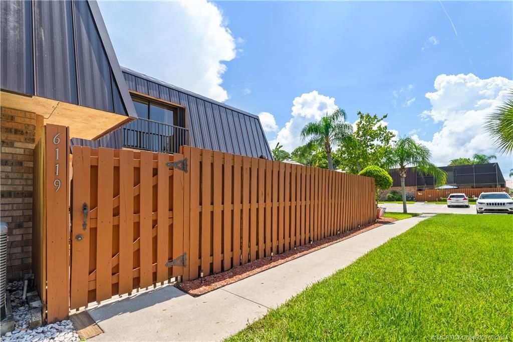 Photo of 6119 SE Windsong Lane #1015, Stuart, FL 34997 (MLS # M20046009)