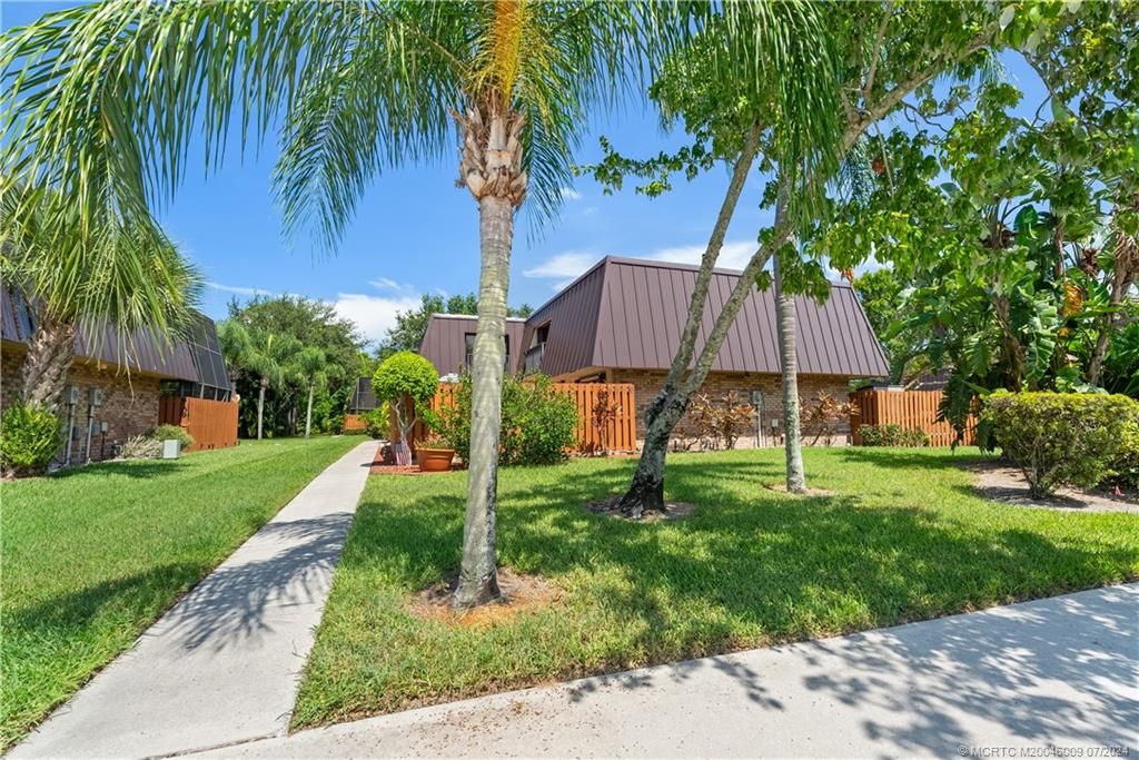 Photo of 6119 SE Windsong Lane #1015, Stuart, FL 34997 (MLS # M20046009)