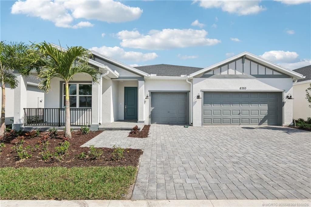 Photo of 6353 NW Cloverdale Avenue, Port Saint Lucie, FL 34987 (MLS # M20048358)
