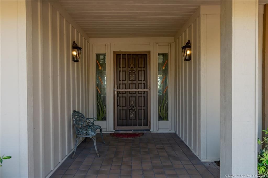 Photo of 6300 SE Winged Foot Drive, Stuart, FL 34997 (MLS # M20049116)