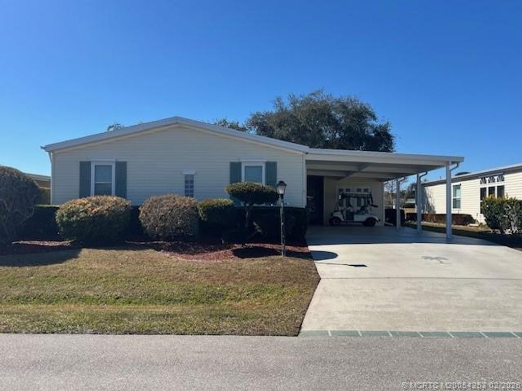 Photo of 7921 Meadowlark Lane, Port Saint Lucie, FL 34952 (MLS # M20054253)