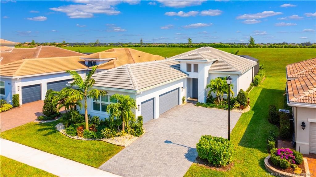 Photo of 9295 SW Miracoli Way, Port Saint Lucie, FL 34987 (MLS # M20049808)