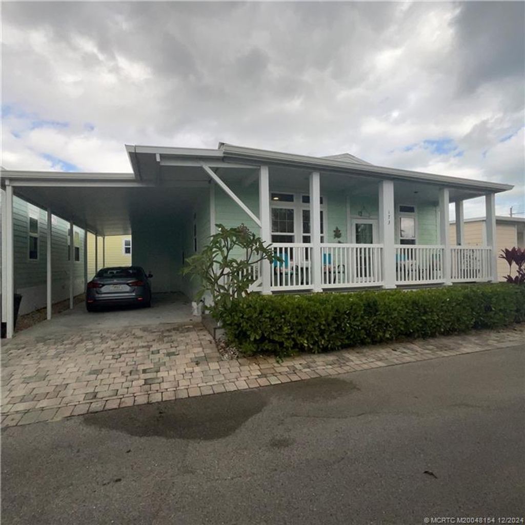 Photo of 173 Portside Drive, Jensen Beach, FL 34997 (MLS # M20048154)