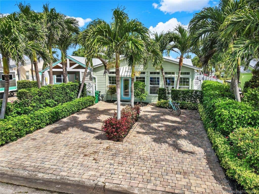 Photo of 34 Aqua Ra Drive, Jensen Beach, FL 34957 (MLS # M20056215)