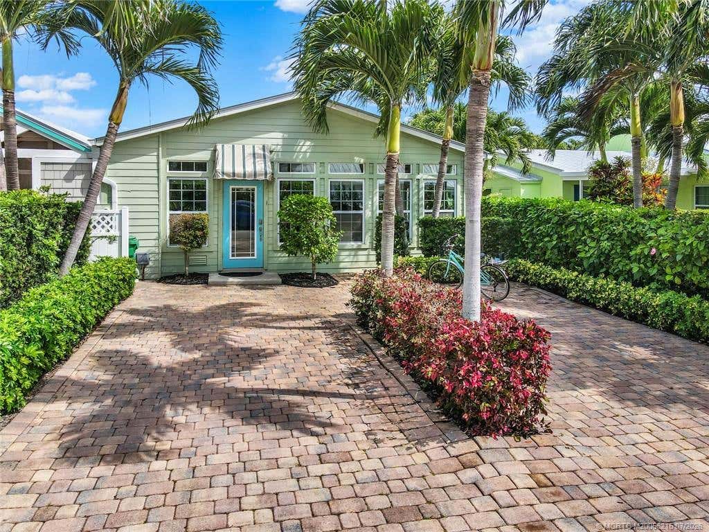 Photo of 34 Aqua Ra Drive, Jensen Beach, FL 34957 (MLS # M20056215)