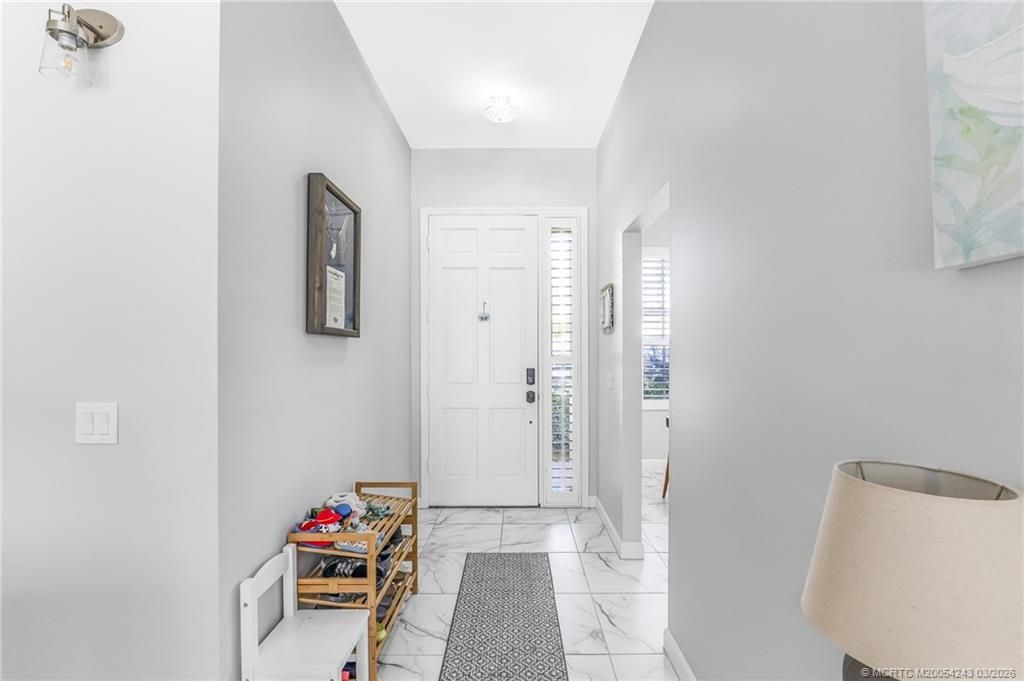 Photo of 9421 Poinciana Court, Fort Pierce, FL 34951 (MLS # M20054243)