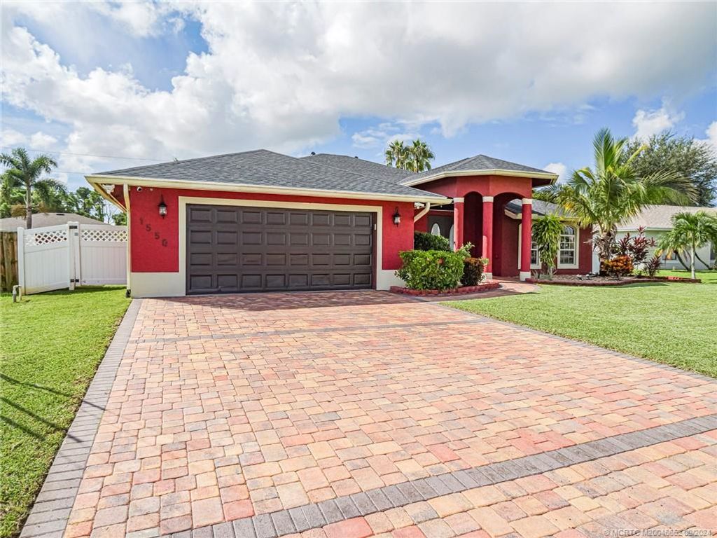 Photo of 1550 SW Mullinax Avenue, Port Saint Lucie, FL 34953 (MLS # M20046652)