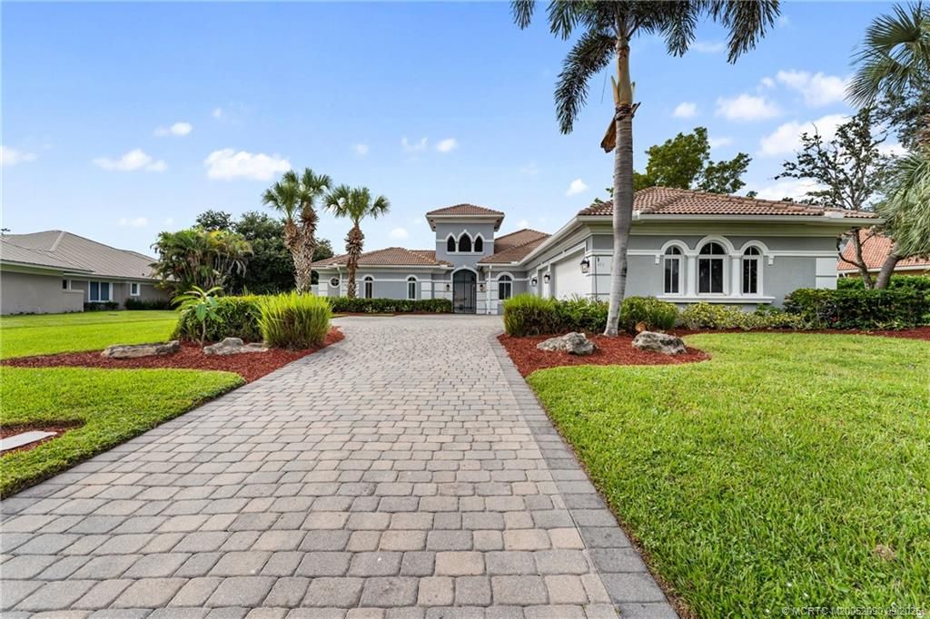 Photo of 872 SW Squire Johns Lane N #A, Palm City, FL 34990 (MLS # M20052090)