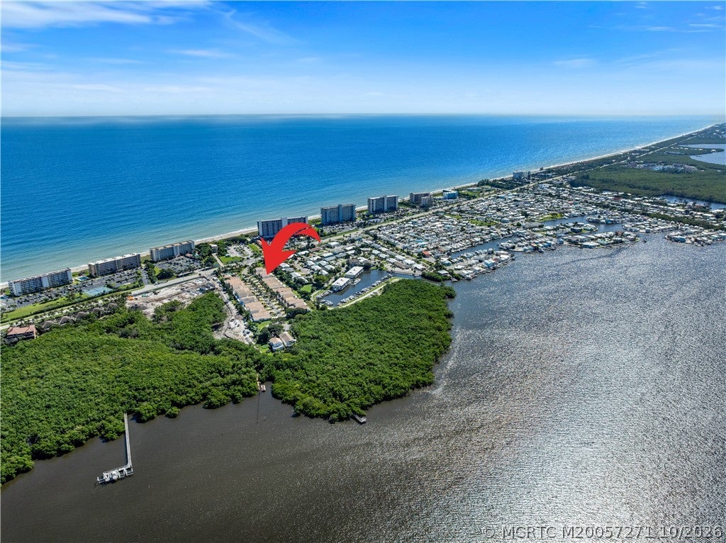 Photo of 115 Pepper Lane, Jensen Beach, FL 34957 (MLS # M20057271)