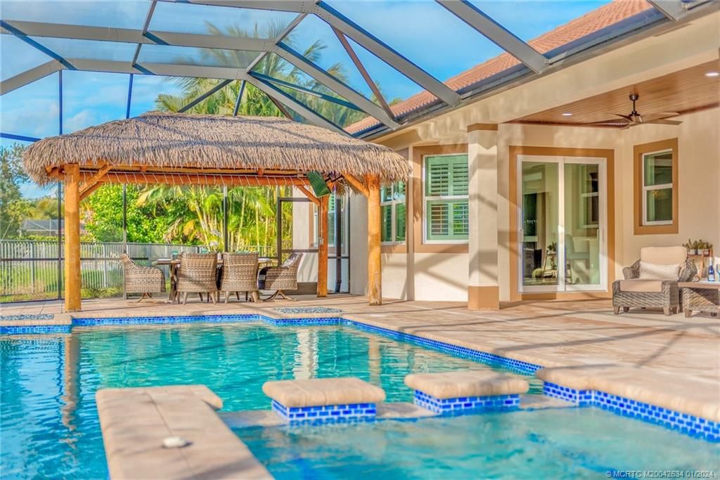 Photo of 7568 SE Ravissant Drive, Stuart, FL 34997 (MLS # M20042634)