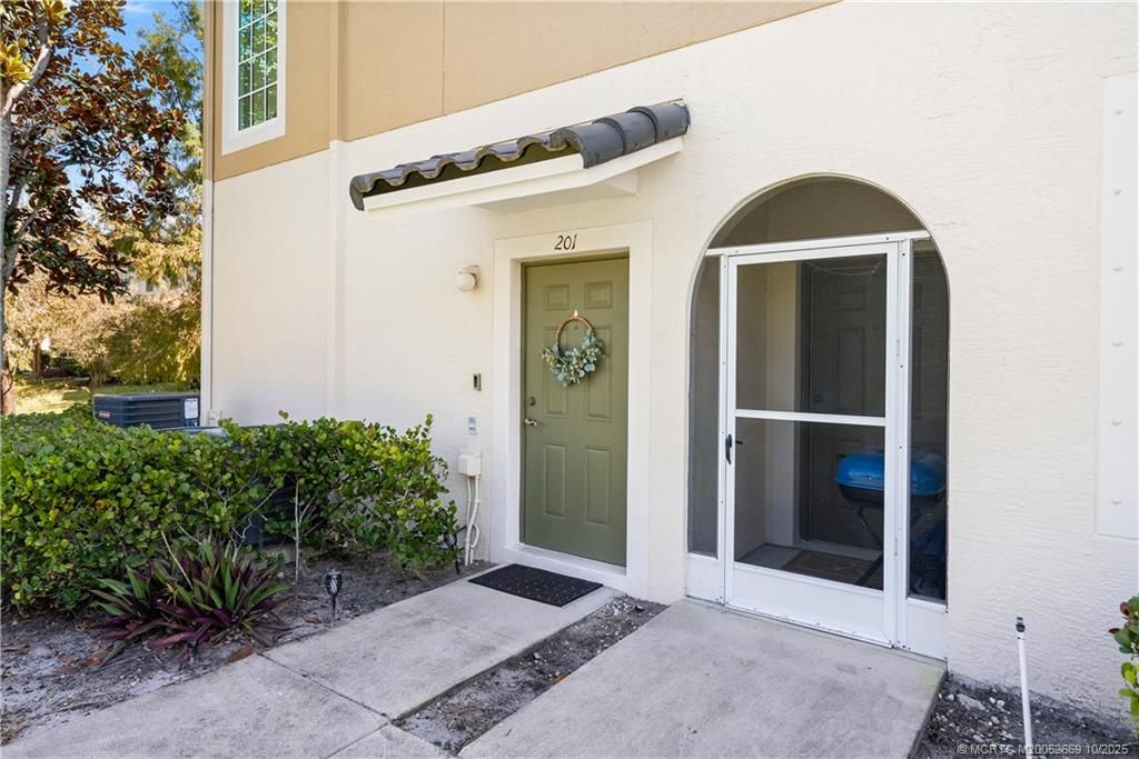 Photo of 3031 SE Lexington Lakes Drive #201, Stuart, FL 34994 (MLS # M20052669)