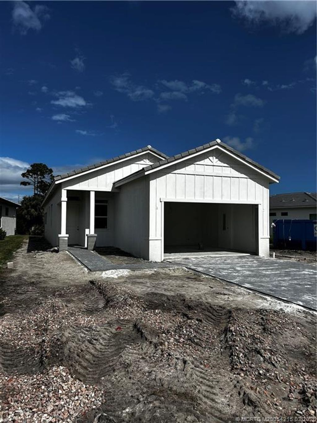 Photo of 435 SE Via Sangro, Port Saint Lucie, FL 34952 (MLS # M20054215)
