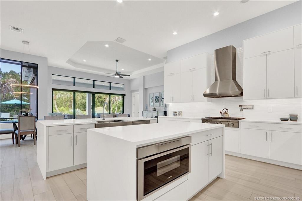 Completely modernized from floor to ceiling, this Canopy Creek home bl – image 11