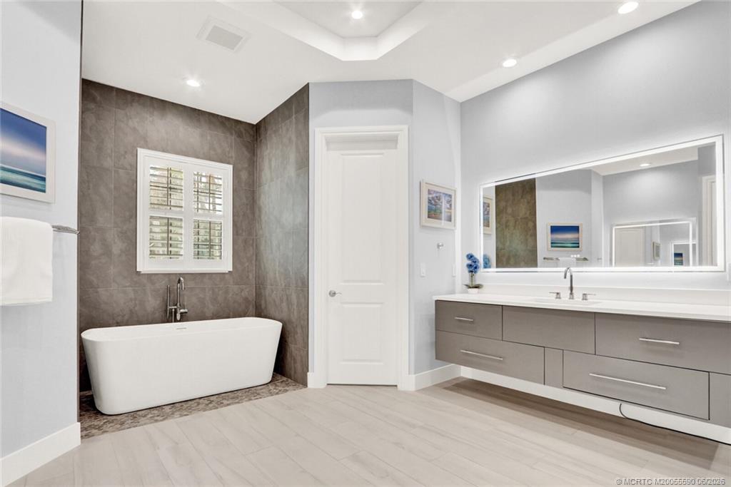 Completely modernized from floor to ceiling, this Canopy Creek home bl – image 16