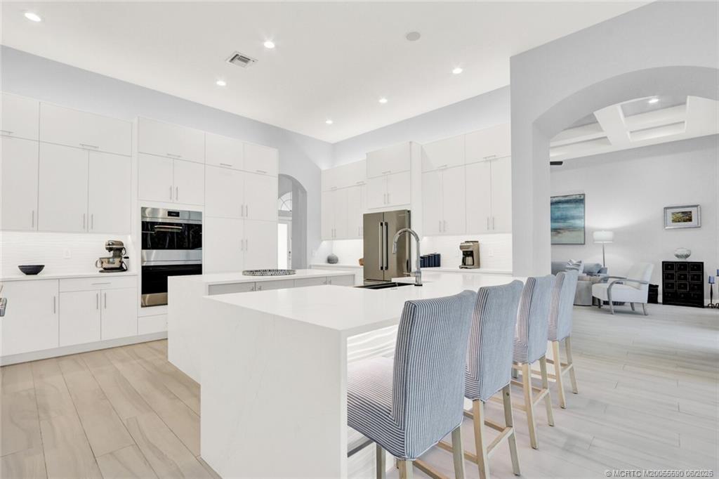 Completely modernized from floor to ceiling, this Canopy Creek home bl – image 10