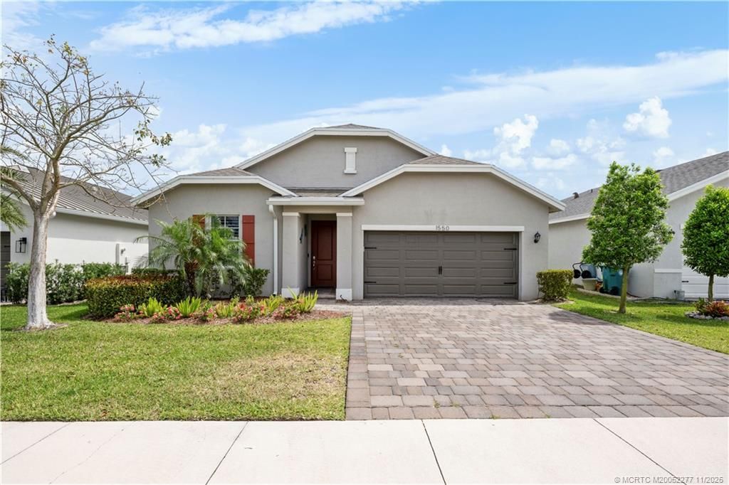 Photo of 1550 NE Skyhigh Terrace, Jensen Beach, FL 34957 (MLS # M20052277)