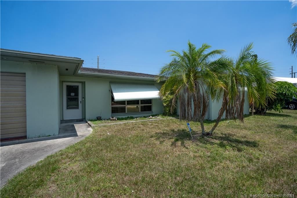Photo of 223 E Arbor Avenue, Port Saint Lucie, FL 34952 (MLS # M20039462)