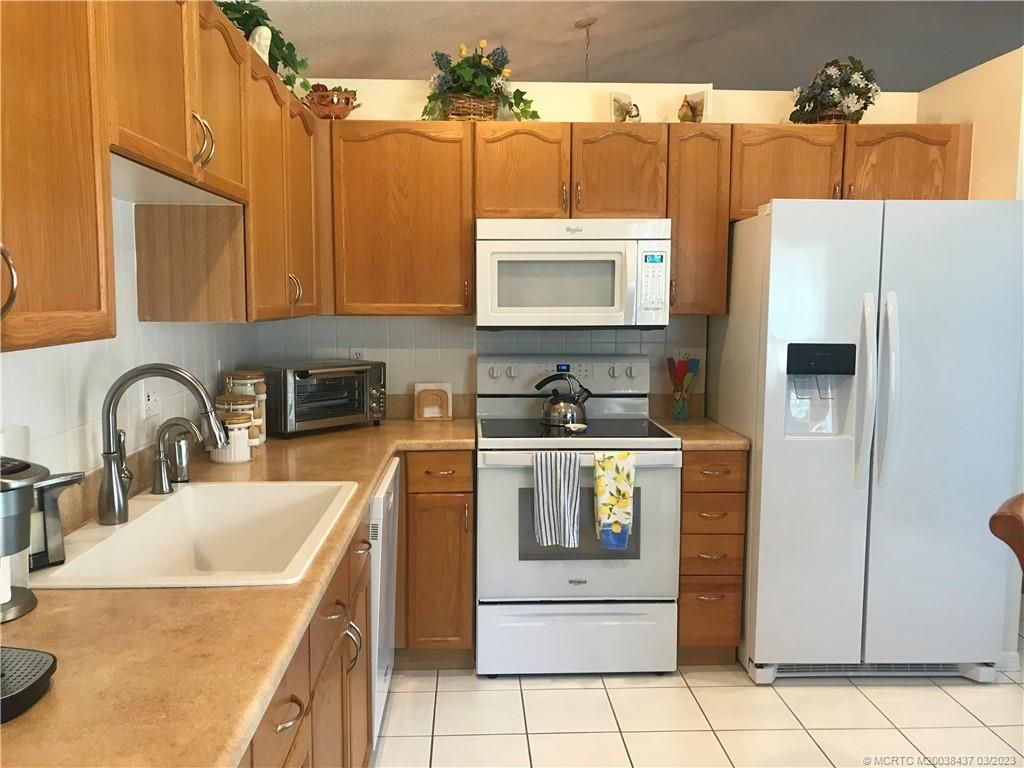 Photo of 2193 SW Olympic Club Terrace, Palm City, FL 34990 (MLS # M20038437)