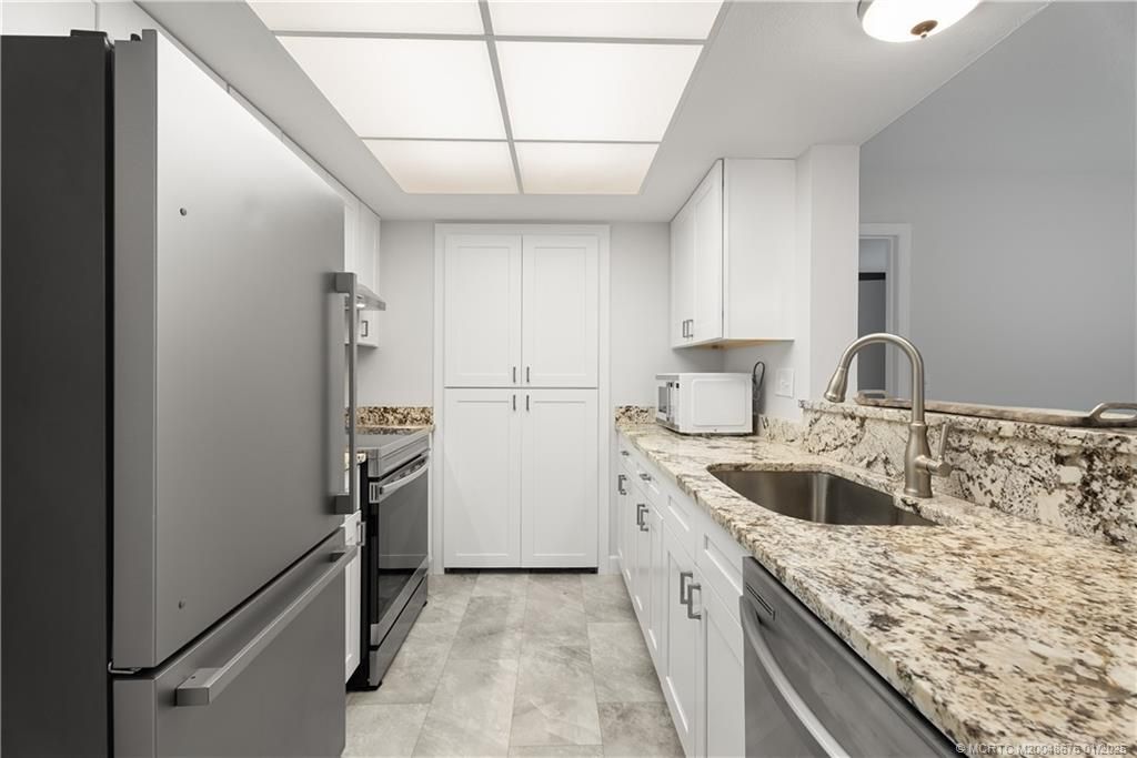 Photo of 3278 SE Aster Lane #F156, Stuart, FL 34994 (MLS # M20048676)