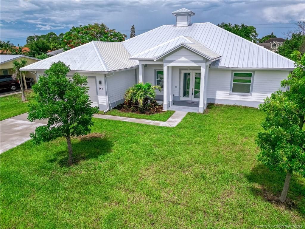 Photo of 261 NW Biltmore Street, Port Saint Lucie, FL 34983 (MLS # M20039769)