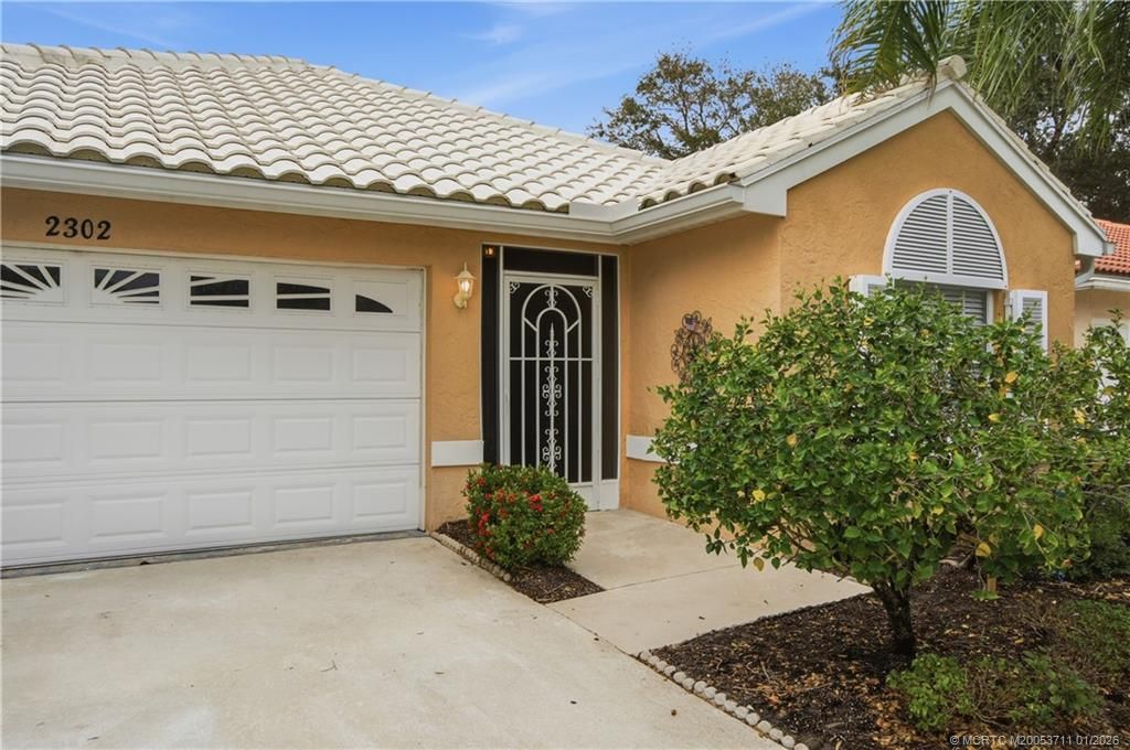 Photo of 2302 SW Olympic Club Terrace, Palm City, FL 34990 (MLS # M20053711)