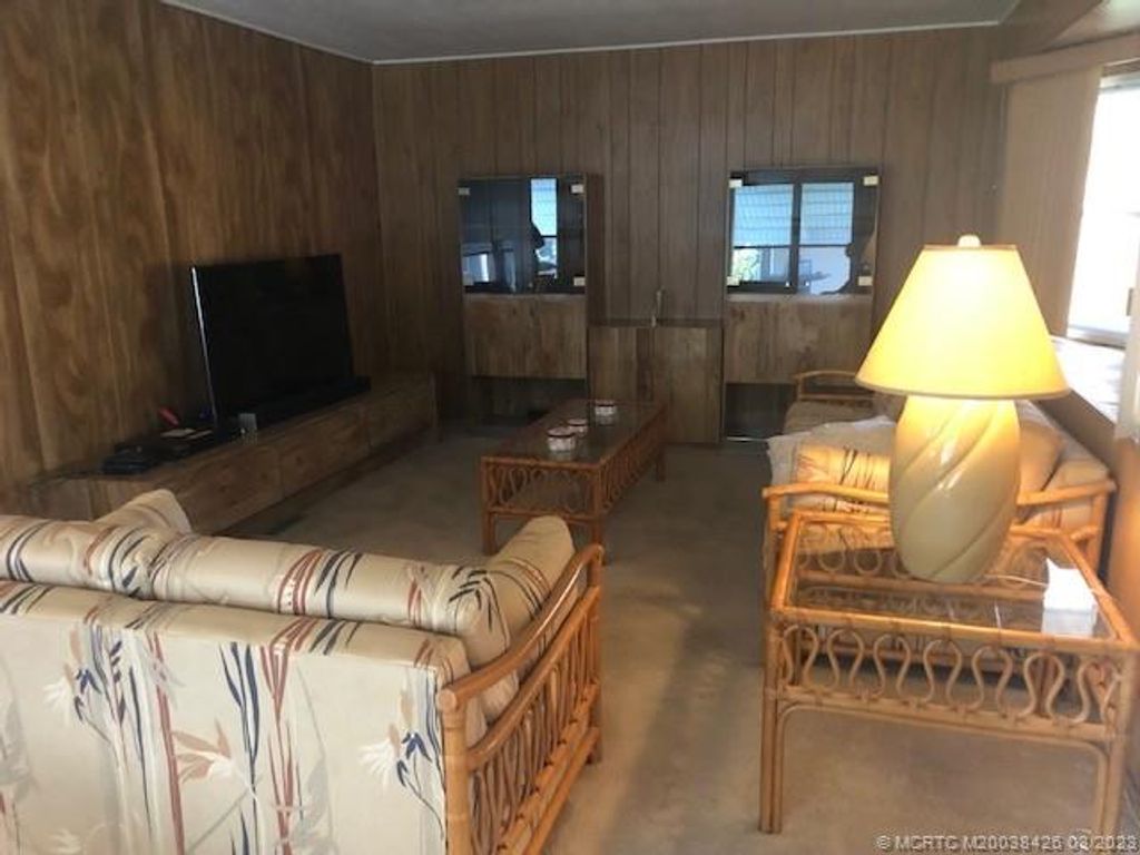 Photo of 21 Los Lagos Ln, Port Saint Lucie, FL 34952 (MLS # M20038426)