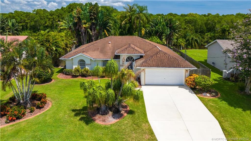 Photo of 131 NE ROYCE Avenue, Port Saint Lucie, FL 34983 (MLS # M20040858)