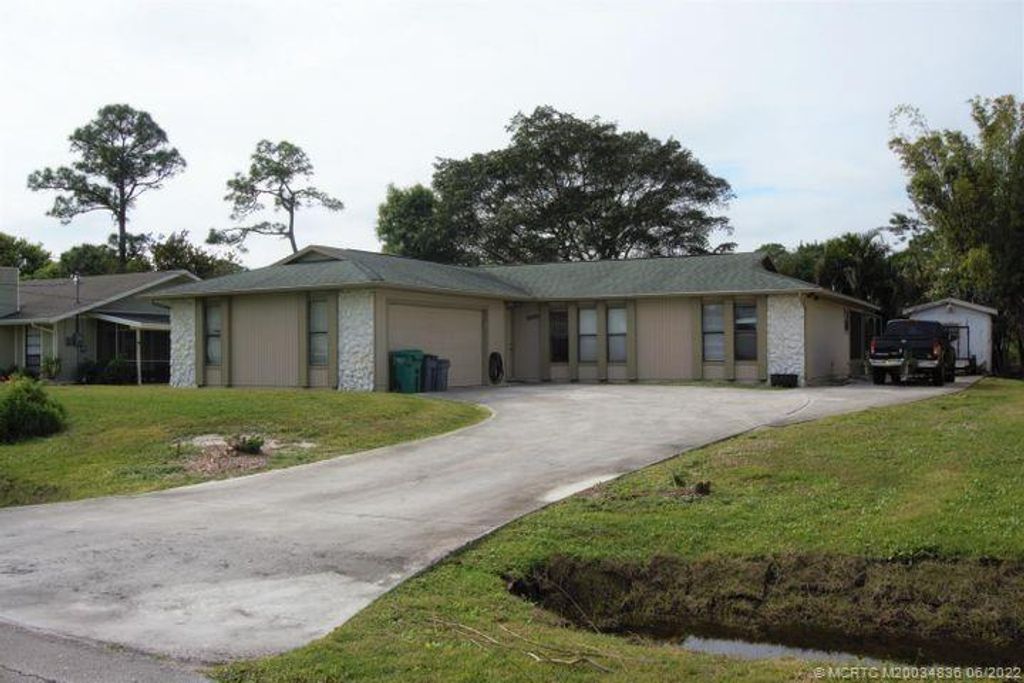 Photo of 6005 E Balsam Drive, Fort Pierce, FL 34982 (MLS # M20034836)