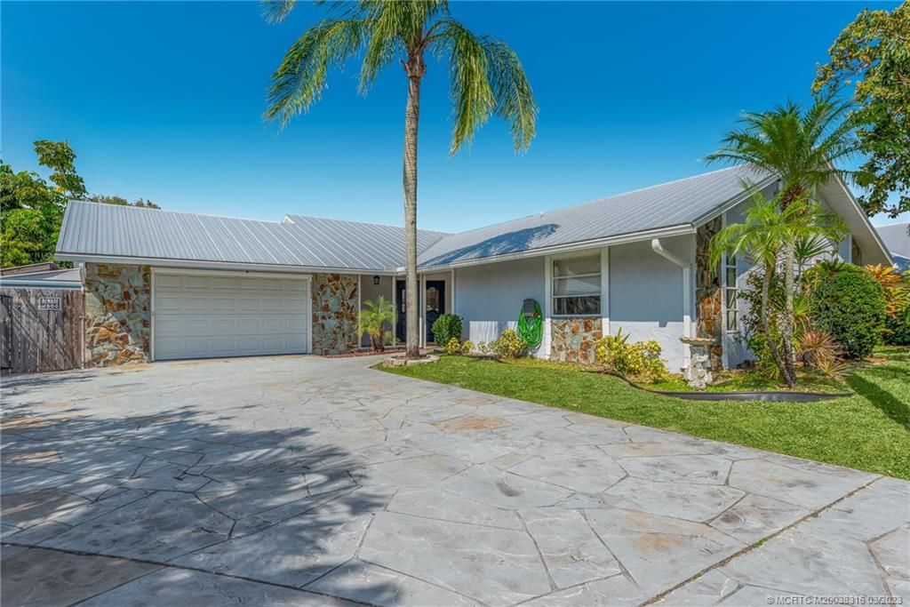 Photo of 5093 SE Tall Pines Way, Stuart, FL 34997 (MLS # M20038316)