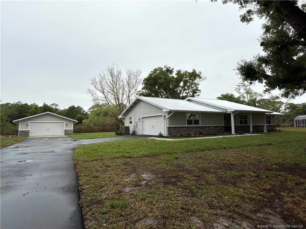 Photo of 14960 SW Myrtle Drive, Indiantown, FL 34956 (MLS # M20054756)