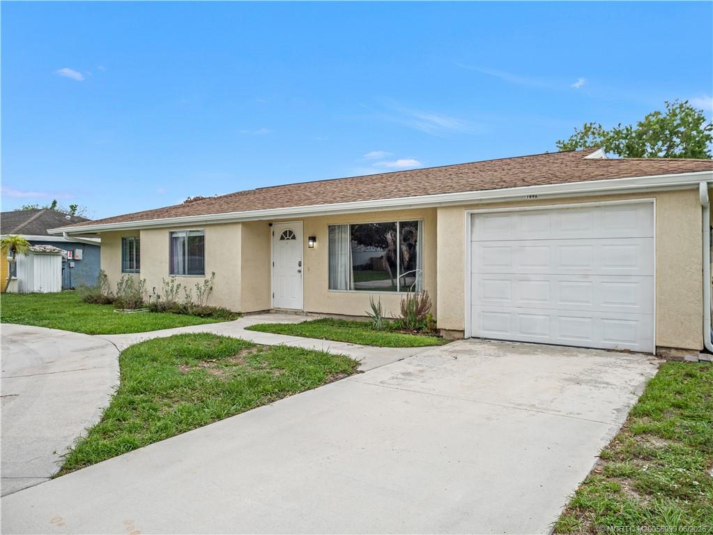 Photo of 1862 SE Rainier Road, Port Saint Lucie, FL 34952 (MLS # M20056099)