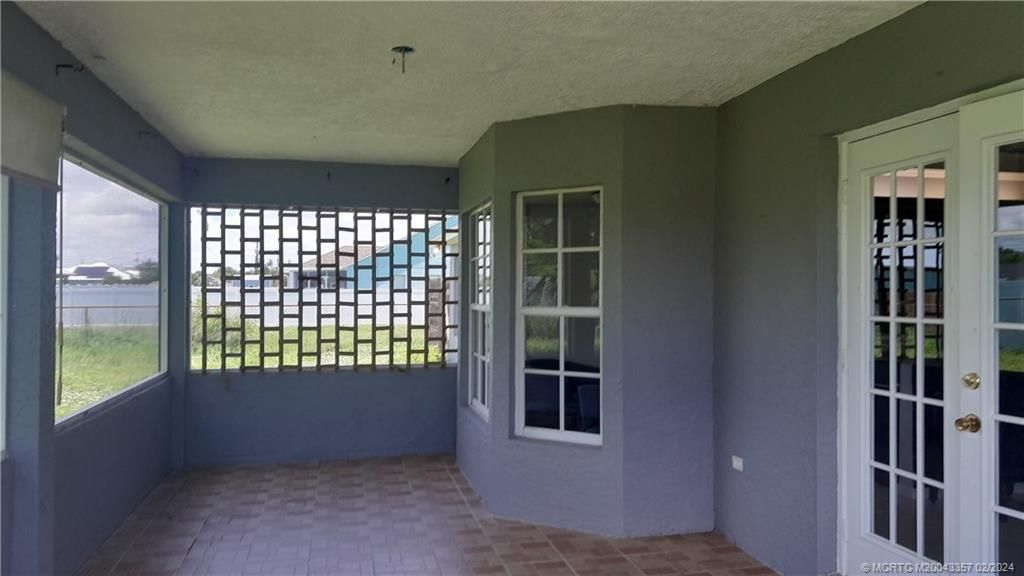 Photo of 4502 SW Attlee Street, Port Saint Lucie, FL 34953 (MLS # M20043357)