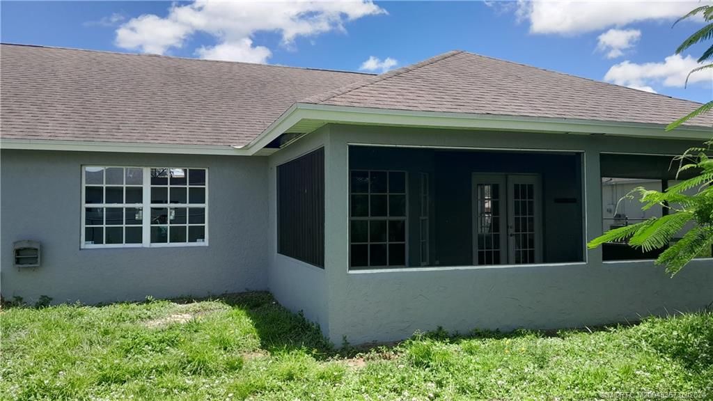 Photo of 4502 SW Attlee Street, Port Saint Lucie, FL 34953 (MLS # M20043357)