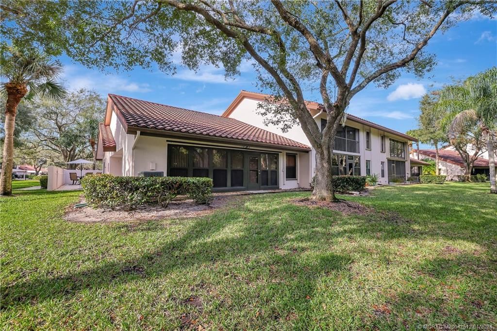 Photo of 6031 SE Martinique Drive #104, Stuart, FL 34997 (MLS # M20042512)