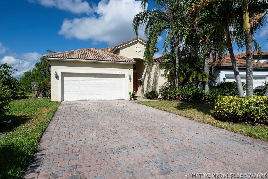 Photo of 2096 NW Marsh Rabbit Lane, Jensen Beach, FL 34957 (MLS # M20056328)