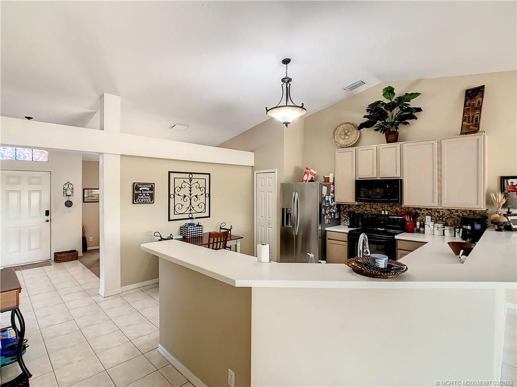 Photo of 3851 SW Mccrory Street, Port Saint Lucie, FL 34953 (MLS # M20038397)