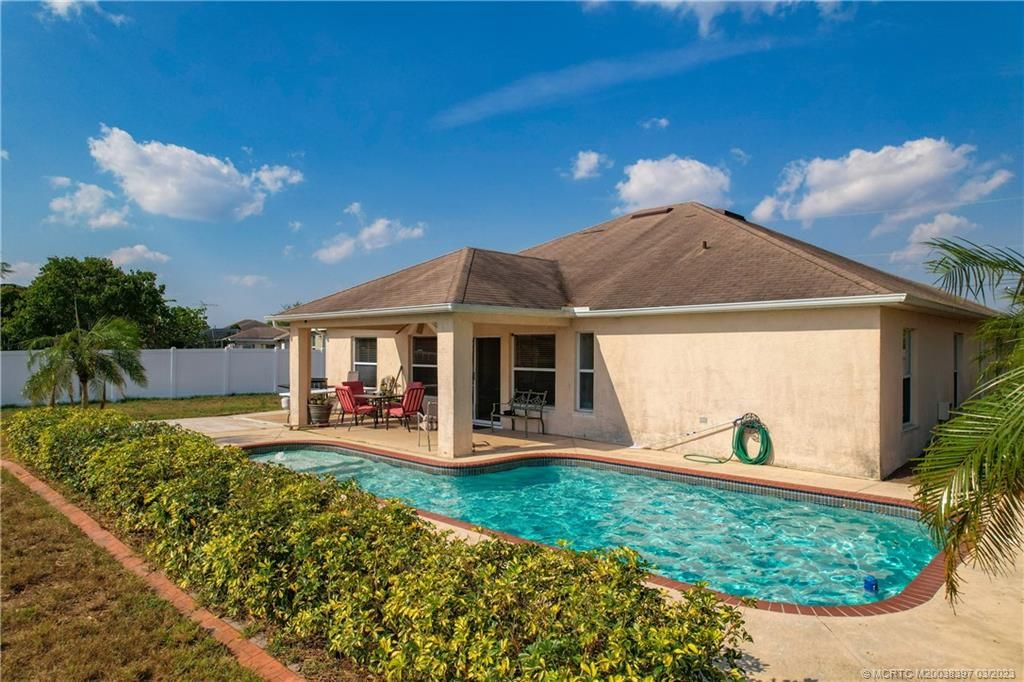 Photo of 3851 SW Mccrory Street, Port Saint Lucie, FL 34953 (MLS # M20038397)