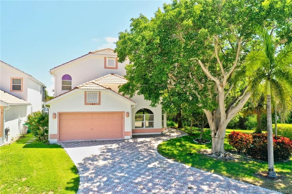 Photo of 163 Pepper Lane, Jensen Beach, FL 34957 (MLS # M20038574)