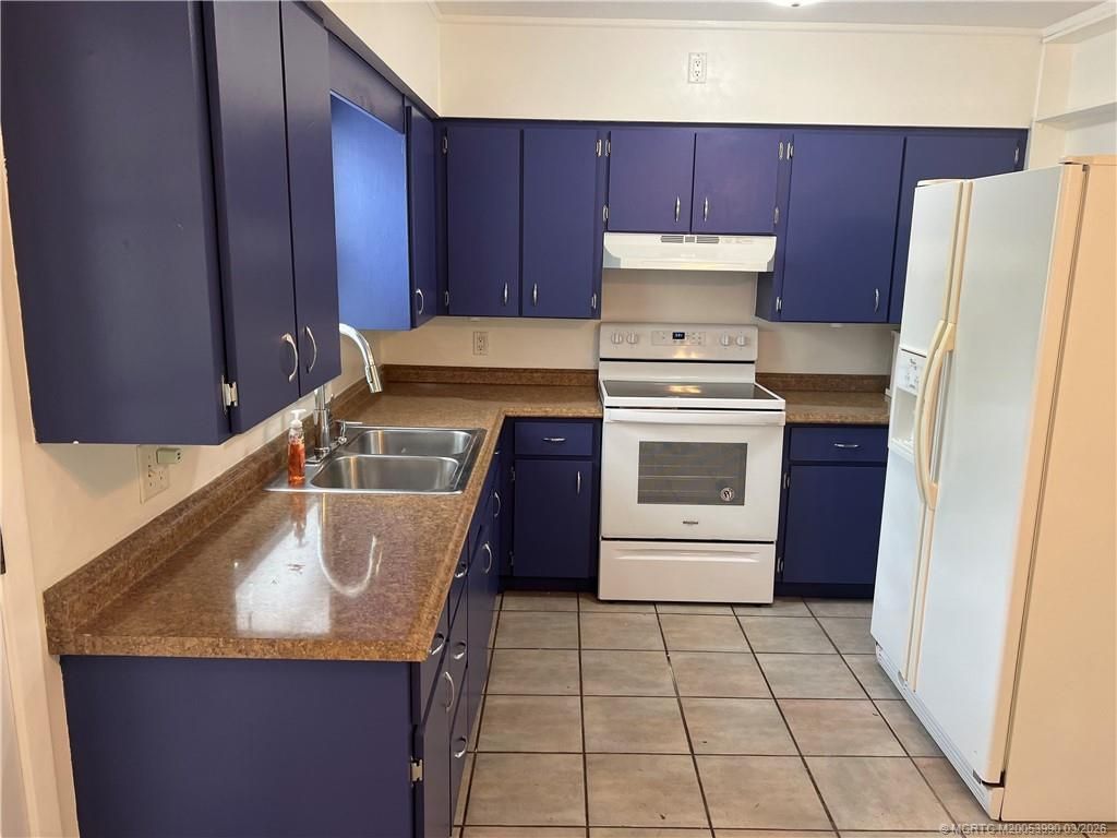 Photo of 2172 NE Pelican Terrace, Jensen Beach, FL 34957 (MLS # M20053990)