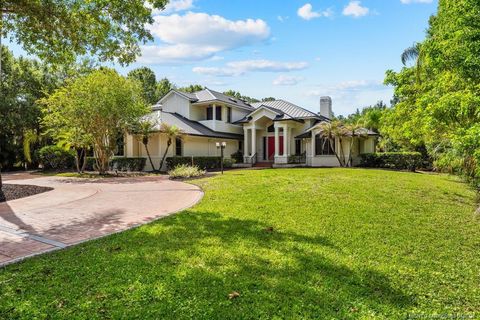 Photo of 1930 SW Crane Creek Avenue, Palm City, FL 34990 (MLS # M20055398)