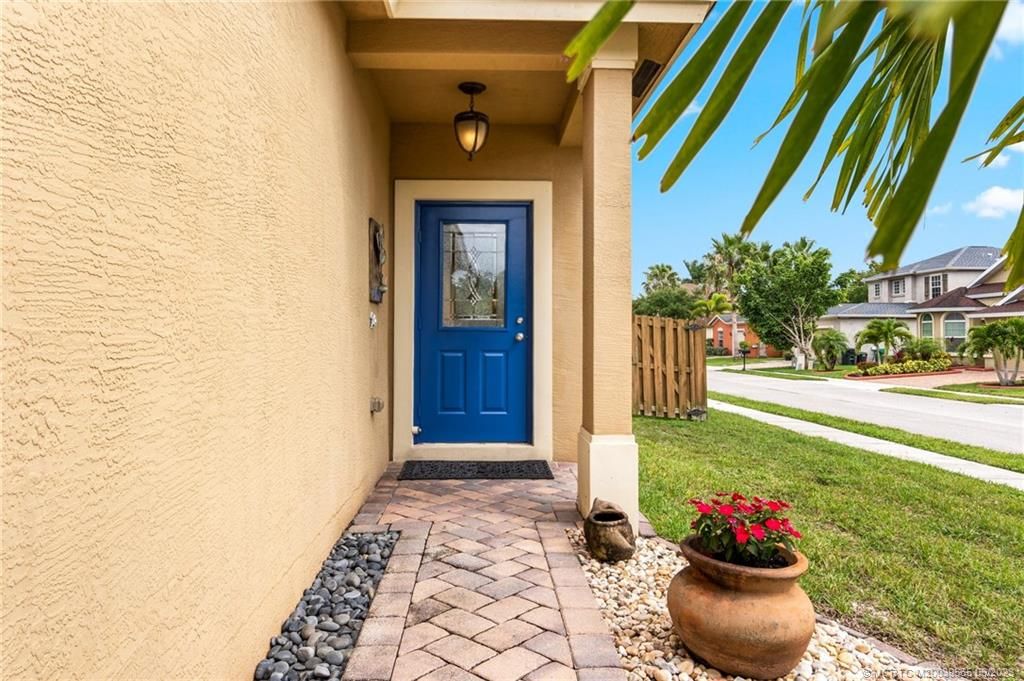 Photo of 9319 Treasure Coast Street, Fort Pierce, FL 34945 (MLS # M20039665)
