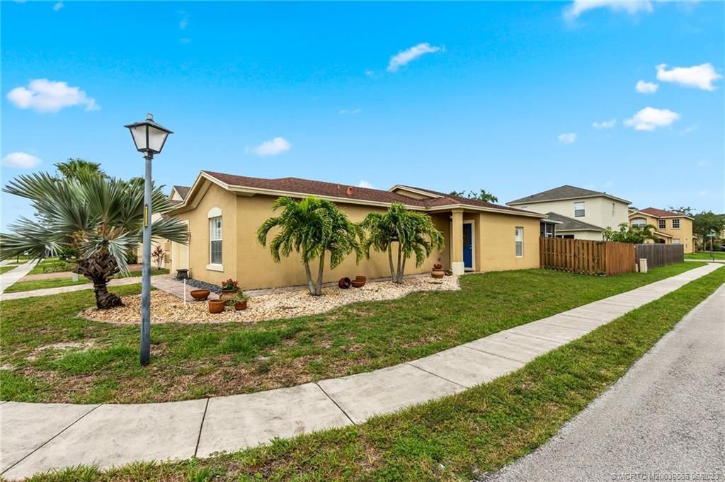 Photo of 9319 Treasure Coast Street, Fort Pierce, FL 34945 (MLS # M20039665)