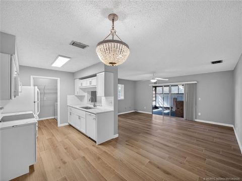 Photo of 3986 NW Cinnamon Tree Circle, Jensen Beach, FL 34957 (MLS # M20054354)