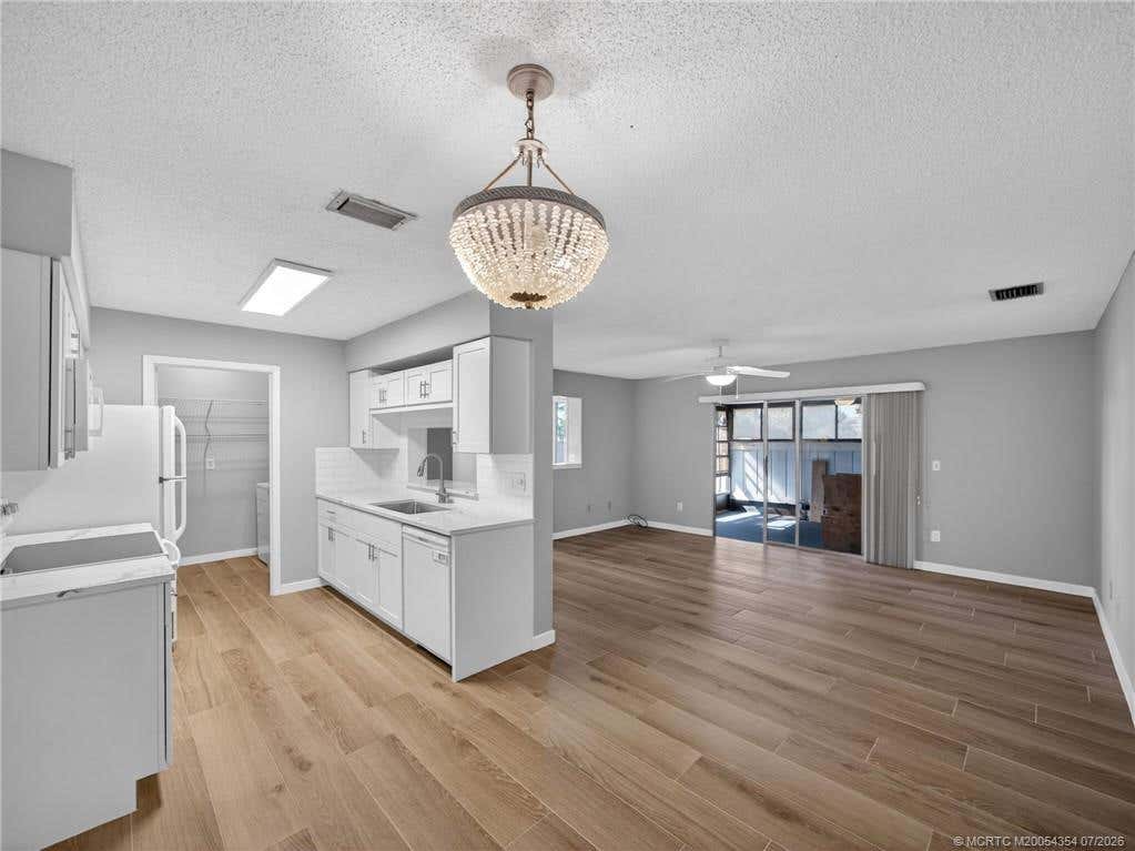 Photo of 3986 NW Cinnamon Tree Circle, Jensen Beach, FL 34957 (MLS # M20054354)