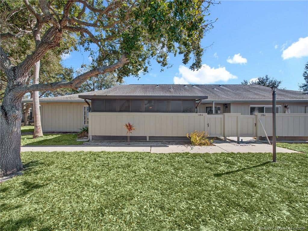 Photo of 3986 NW Cinnamon Tree Circle, Jensen Beach, FL 34957 (MLS # M20054354)