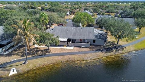 Photo of 3986 NW Cinnamon Tree Circle, Jensen Beach, FL 34957 (MLS # M20054354)