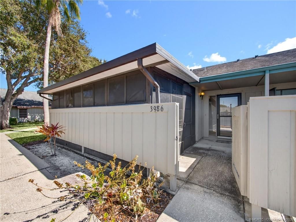 Photo of 3986 NW Cinnamon Tree Circle, Jensen Beach, FL 34957 (MLS # M20054354)